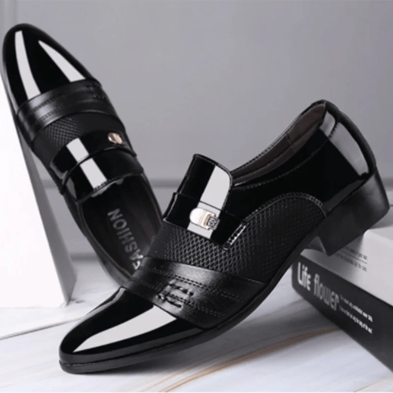 Black Luxury Leather Men's Shoes with a textured design on a light gray background