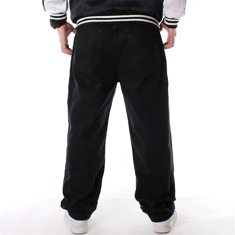 Person wearing black pants on a white background