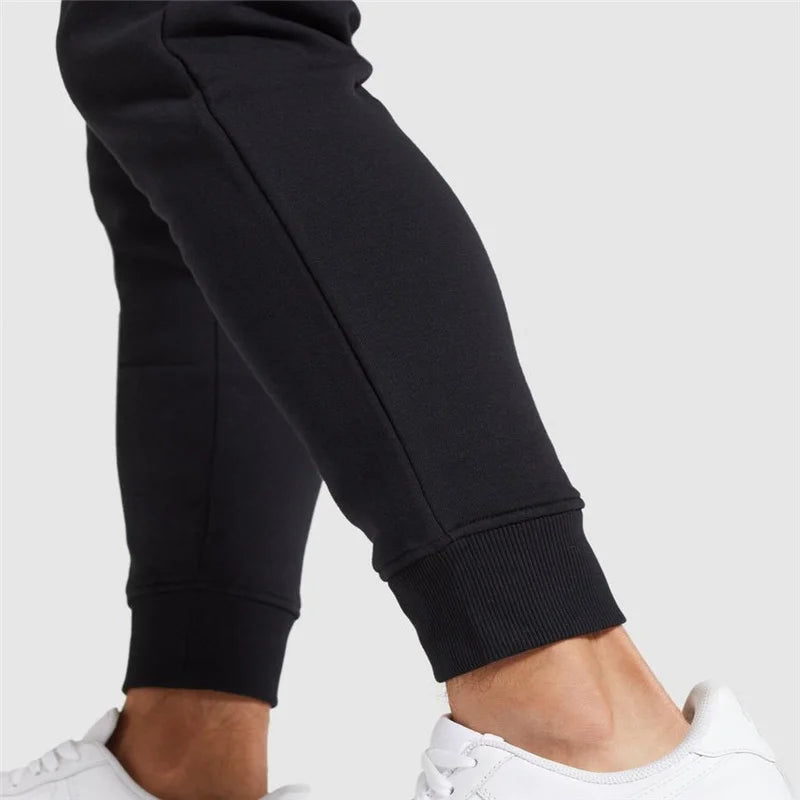 Women's jogger sweatpants with cat paw print design β soft cotton blend, ideal for fitness, lounging, and casual wear.