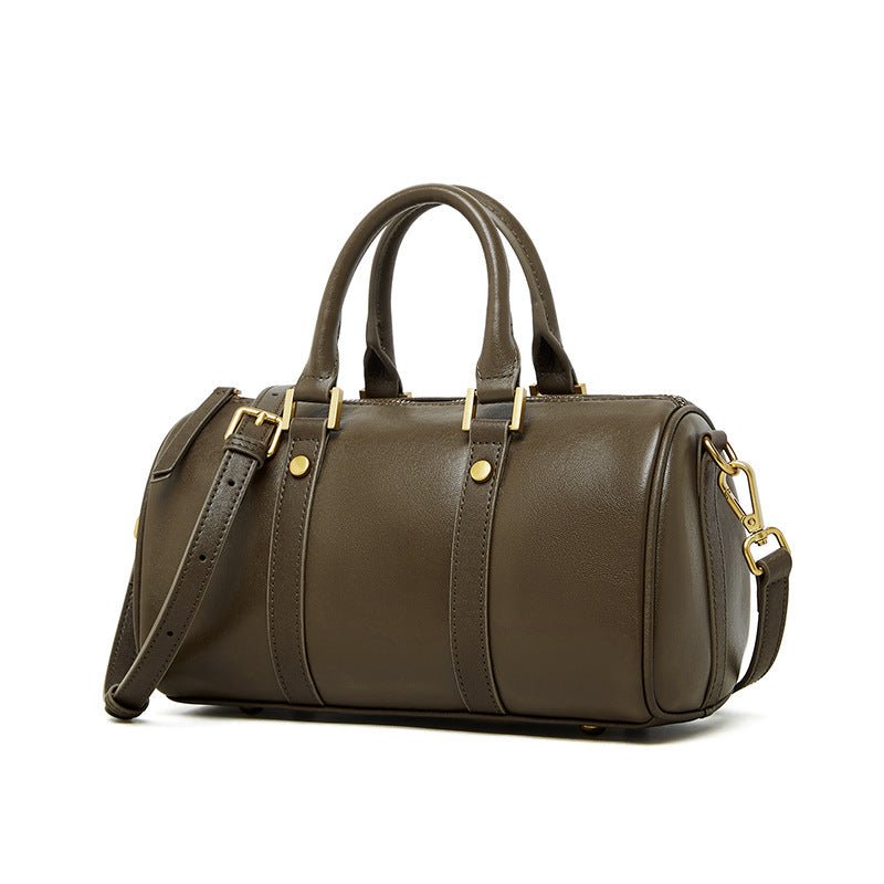 Brown leather duffel bag on a white background