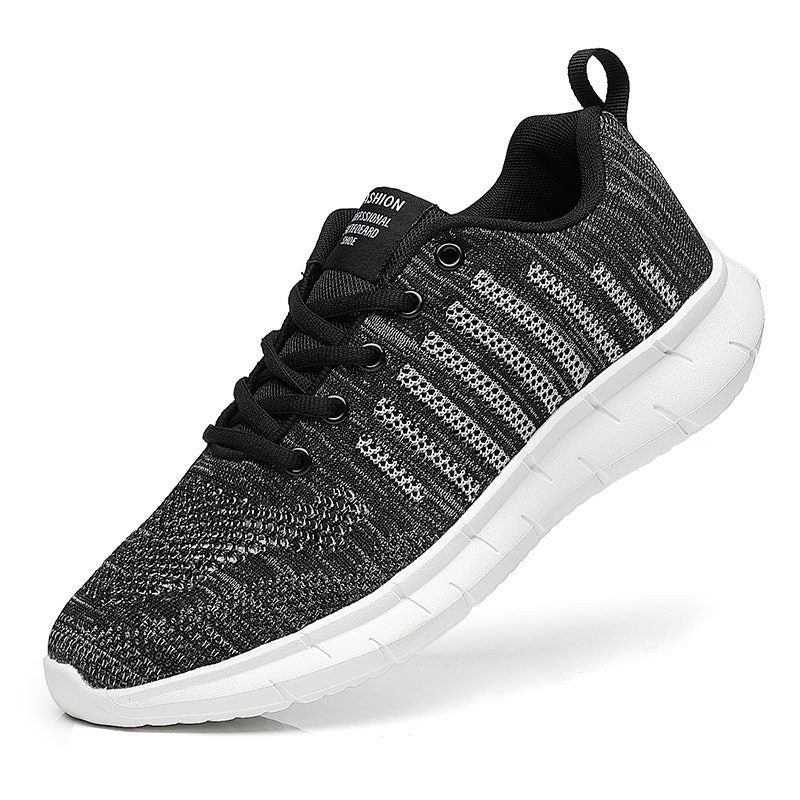 Gray and black sneaker with white sole on a white background