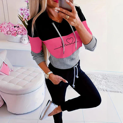 Combinación de pantalones y sudadera con detalle de rayas para mujer