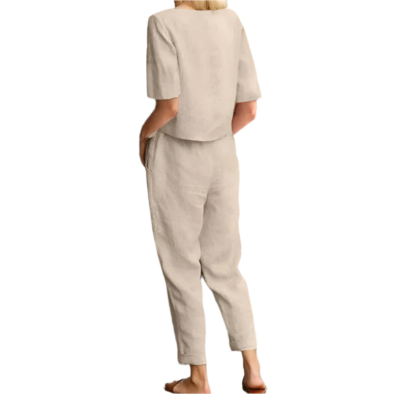 Women's Cotton Linen Summer Suit. A breathable two-piece set with a half-sleeved top and wide-leg trousers.