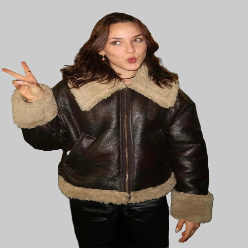 Woman wearing a faux leather jacket for cold weather protection