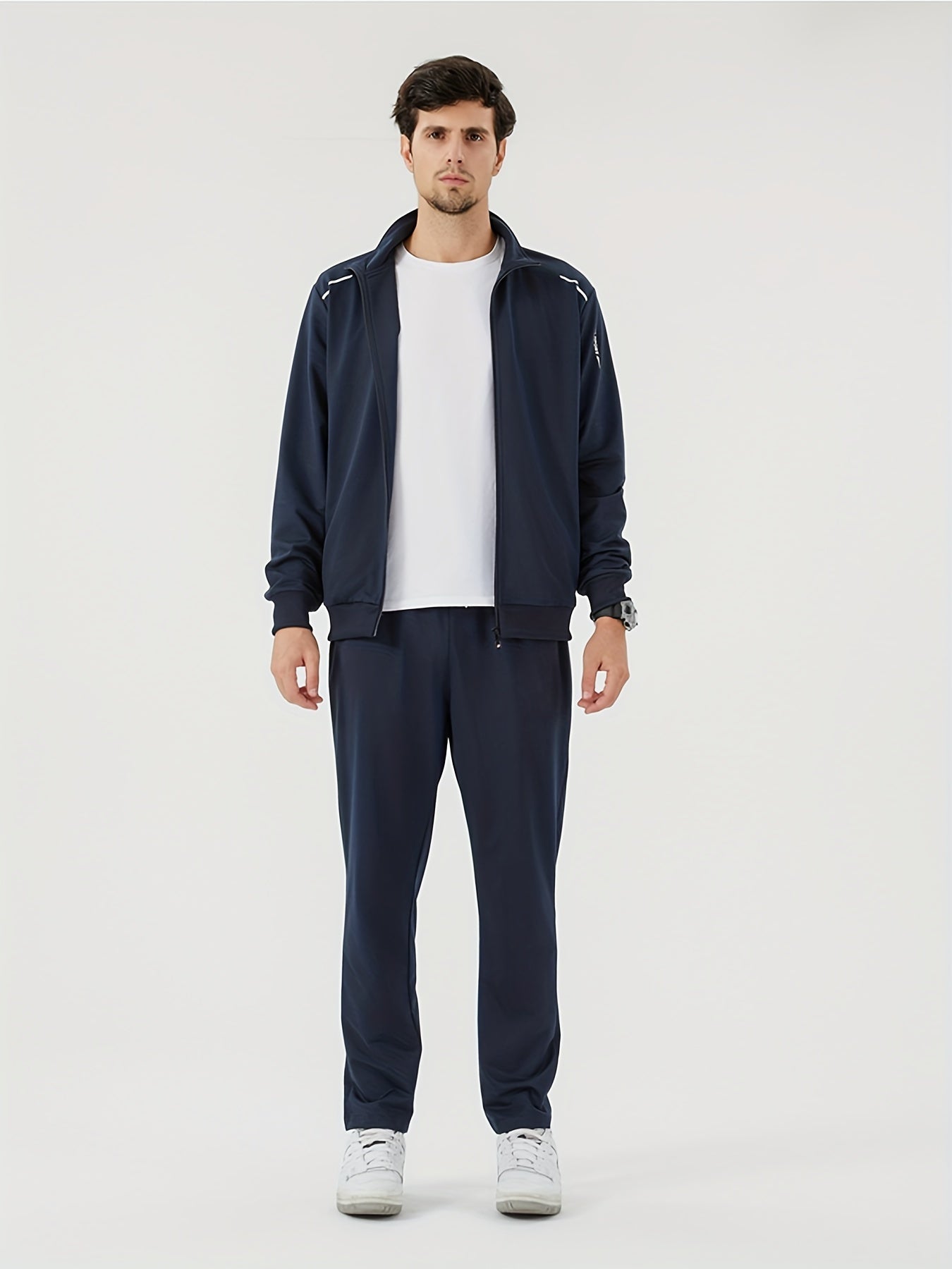 Man wearing Jacket, pants and t-shirt Text: Fleece Men's Athletic Tracksuit in CasualFlowShop