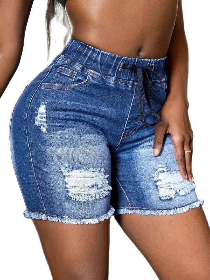 Blue ripped denim shorts for women, stylish and casual summer wear.